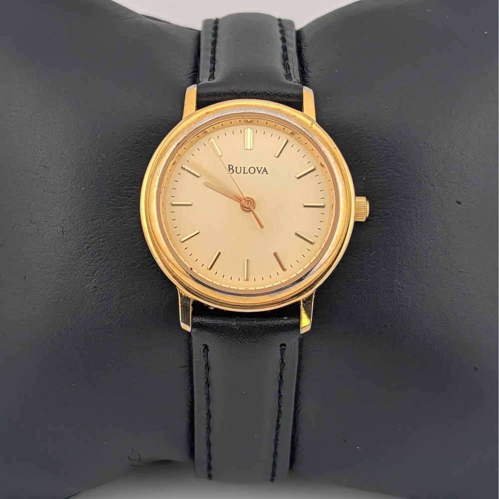 Bulova Gold Tone Dress Watch Champagne Dial Black Leather Strap Quartz Vintage